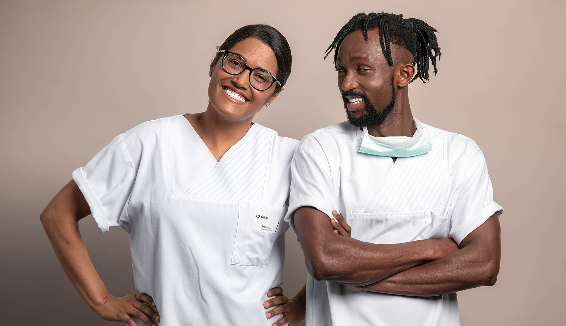 Two employees laughing